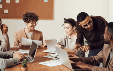 Image of group meeting in the office board room