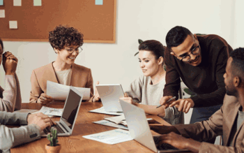 Image of group meeting in the office board room