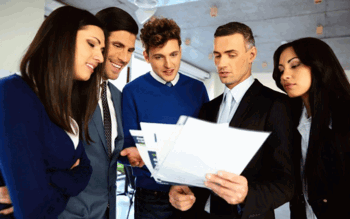 Image of Manager showing team printed report 